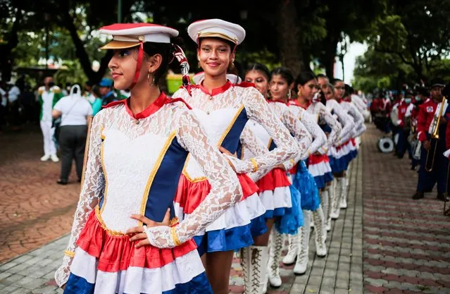 Students take part in a parade during celebrations commemorating Nicaragua's 201th anniversary at the revolution square in Managua, on September 14, 2022. (Photo by Oswaldo Rivas/AFP Photo)