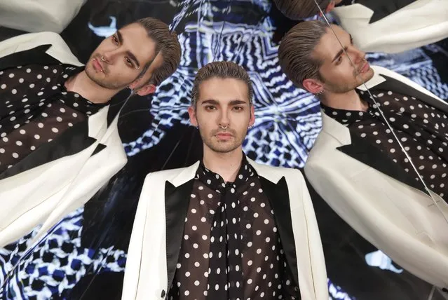 German singer Bill Kaulitz stands on the Instagram photo corner during the German house Lala Berlin show at the Mercedes-Benz Fashion Week in Berlin, Germany, 19 January 2016. (Photo by Joerg Carstensen/EPA)