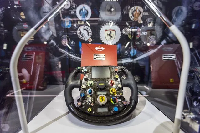 The steering wheel of the Ferrari F2003 GA chassis number 229 with which Formula One F1 driver Michael Schumacher won his sixth World Championship title is seen during a preview at Sotheby's before the auction sale where it is estimated to fetch between 7,500,000 and 9,500,000 CHF, in Geneva, Switzerland on November 4, 2022. (Photo by Denis Balibouse/Reuters)