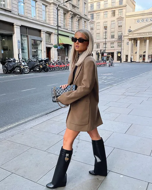 UK TV personality Molly-Mae Hague, 22, rocked the pricey footwear, which were adorned with padlocks in London on November 28, 2021. (Photo by Instagram)