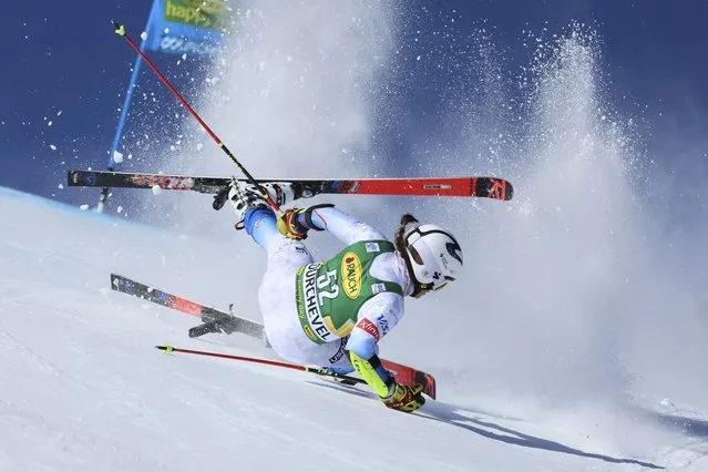 United States' Katie Hensien falls during the first run of an alpine ski, women's World Cup giant slalom, in Courchevel, France, Tuesday, December 21, 2021. (Photo by Marco Trovati/AP Photo)