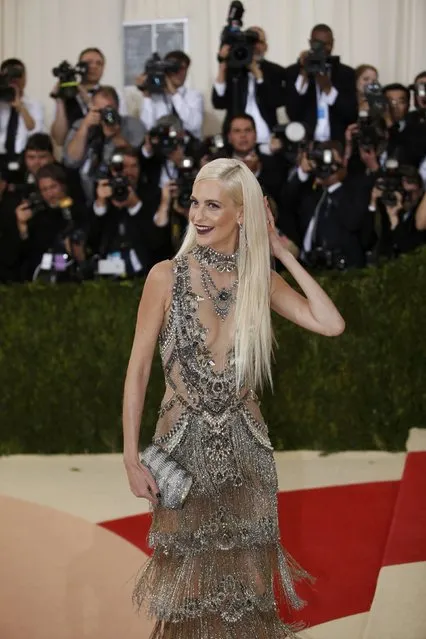 Model Poppy Delevingne arrives at the Metropolitan Museum of Art Costume Institute Gala (Met Gala) to celebrate the opening of “Manus x Machina: Fashion in an Age of Technology” in the Manhattan borough of New York, May 2, 2016. (Photo by Eduardo Munoz/Reuters)