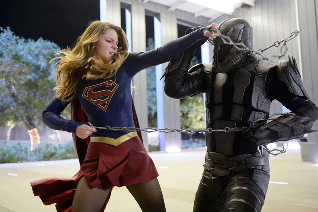 In this image released by CBS, Melissa Benoist, left, and Jeff Branson appear in a scene from “Supergirl”. The CW said Thursday, May 12, 2016, that it's picking up the series from CBS, where it debuted last year. (Photo by Darren Michaels/Warner Bros. Entertainment Inc. via AP Photo)