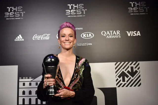 The Best FIFA Women's Player Award Winner Megan Rapinoe of Reign FC and United States poses with the trophy during The Best FIFA Football Awards 2019 at Teatro alla Scala on September 23, 2019 in Milan, Italy. (Photo by Tullio Puglia – FIFA/FIFA via Getty Images)