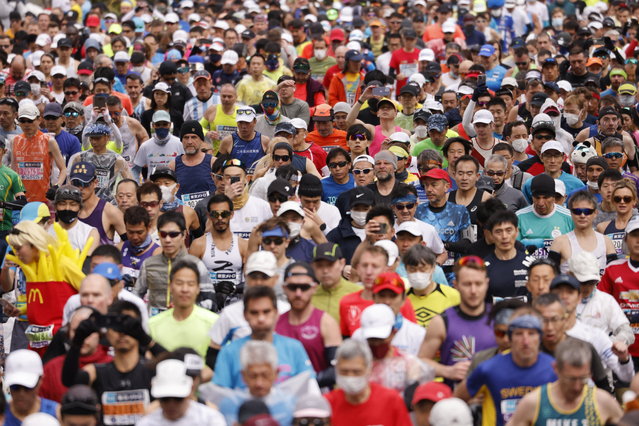 Runners take part in the Tokyo Marathon 2023 in Tokyo on March 5, 2023. (Photo by Issei Kato/Pool via AFP Photo)