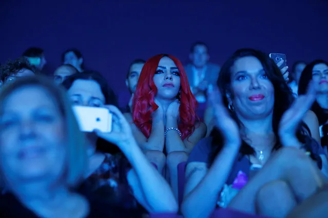 People in the crowd watch the first-ever Miss Trans Israel beauty pageant in Tel Aviv, Israel May 27, 2016. (Photo by Amir Cohen/Reuters)