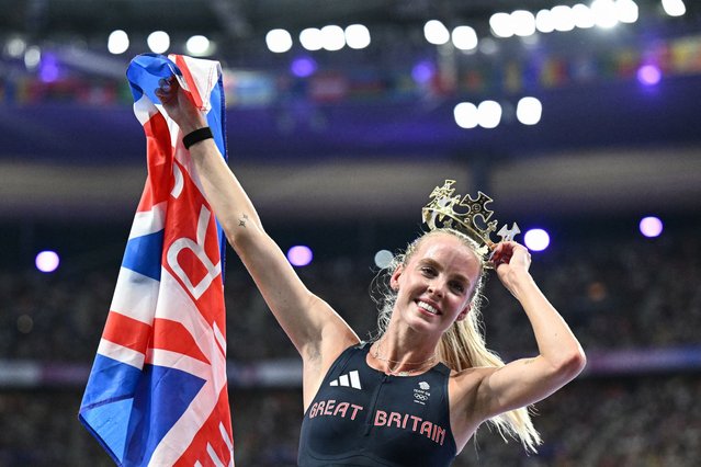 Britain's Keely Hodgkinson celebrates after winning the women's 800m final of the athletics event at the Paris 2024 Olympic Games at Stade de France in Saint-Denis, north of Paris, on August 5, 2024. (Photo by Jewel Samad/AFP Photo)