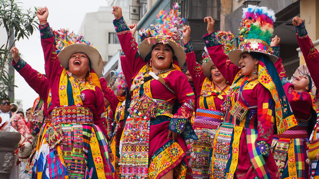 Group of women performing on May 21, 2023 when Peruvian Indigenous folk dancers wearing traditional costumes from the Andean regions took to the streets of Lima downtown again, as they used to do every Sunday before the pandemic, to spread their colorful dances and ancestral traditions. (Photo by Carlos Garcia Granthon/ZUMA Press Wire/Rex Features/Shutterstock)