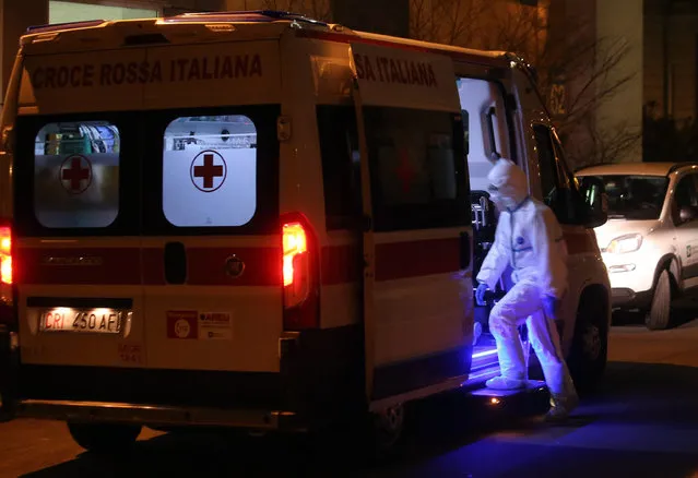 One of the ambulances that transported one of the six people infected by Coronavirus to the Sacco Hospital in Milan, Italy, 21 February 2020. Six people have been reported infected with the novel coronavirus in Italy, all in the region of Lombardy, authorities said. Lombardy Welfare Councilor Gallera during the press conference urged residents in the cities of Lombardy affected by the virus to stay at home as a precautionary measure and avoid all social contact. (Photo by Matteo Bazzi/EPA/EFE)