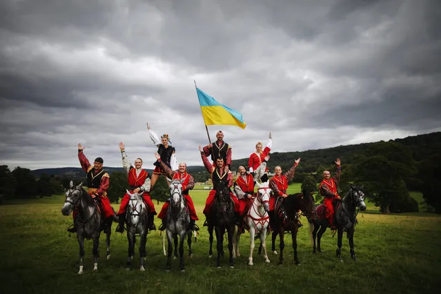The Ukrainian Cossack Stunt team pose as they arrive at Chatsworth House on September 3, 2015 in Chatsworth, England. The Ukrainian Cossack Stunt team are performing this weekend during the Chatsworth Country fair at the stately home of the Duke and Duchess of Devonshire. The team will be perfoming stunts and displaying their world famous horsemanship durng the Chatsworth Country Fair which runs from September 4 to 6, 2015. (Photo by Christopher Furlong/Getty Images)