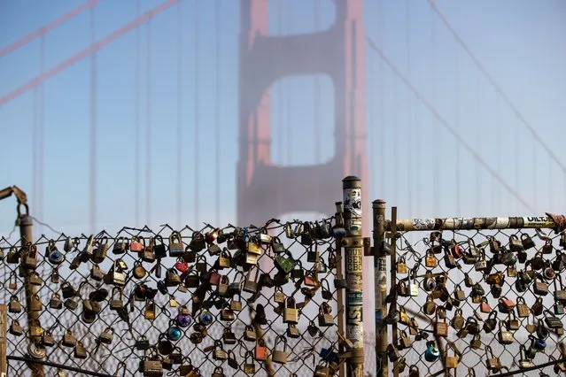 Love locks are seen at the Golden Gate View Point as the San Francisco's most iconic weather fog blankets the Golden Gate Bridge in Marin Headlands of Sausalito, California on September 24, 2022. (Photo by Tayfun Coskun/Anadolu Agency via Getty Images)
