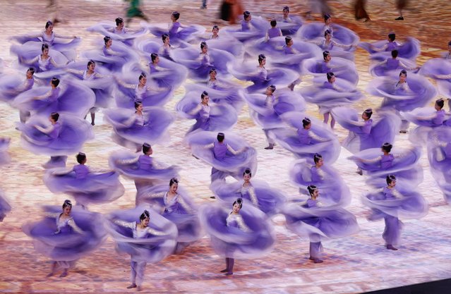Performers dance during the opening ceremony of the 9th Asian Winter Games in Harbin, China, Friday, February 7, 2025. (Photo by Issei Kato/Pool Photo via AP Photo)