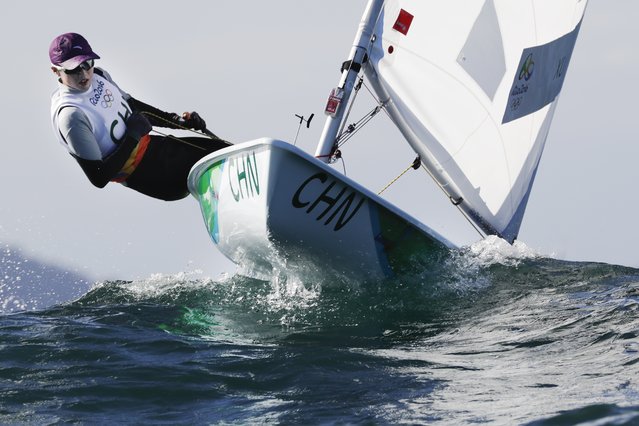 China's Xu Lijia competes during the Laser Radial women race at the 2016 Summer Olympics in Rio de Janeiro, Brazil, Friday, August 12, 2016. (Photo by Bernat Armangue/AP Photo)