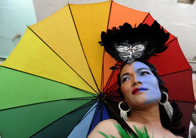 Members of the LGBT community participate in Nepal's Gay Pride parade in Kathmandu on August 19, 2016. Scores of gays, lesbians, transvestites and transsexuals from across the country took part in the rally to spread their campaign for sexual rights in the country. (Photo by Prakash Mathema/AFP Photo)