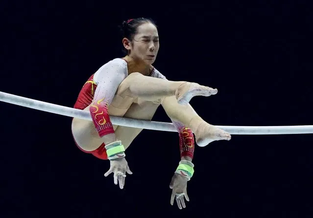 China's Xijing Tang in action during the women's team final uneven bars at the Artistic Gymnastics World Championships at M&S Bank Arena in Liverpool, Britain on November 1, 2022. (Photo by Phil Noble/Reuters)