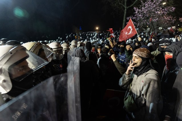 Protesters face riot police as they try to march to Taksim Square from the Istanbul Municipality headquarters during a protest against the detention of Istanbul Mayor Ekrem Imamoglu in Istanbul, Turkey, 24 March 2025. Istanbul Mayor Ekrem Imamoglu of the Republican People's Party (CHP) was jailed and dismissed by the Turkish Ministry of Interior on 23 March on corruption charges following his detention on March 19 along with 100 others. (Phoot by Erdem Sahin/EPA)
