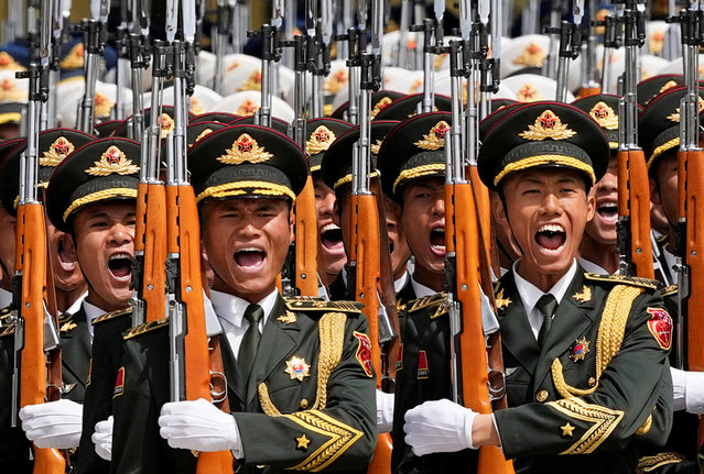 Chinese honor guards march on the day of a ceremony attended by Chinese President Xi Jinping and Azerbaijani President Ilham Aliyev at The Great Hall of The People in Beijing, China, on April 23, 2025. (Photo by Iori Sagisawa/Pool via Reuters)