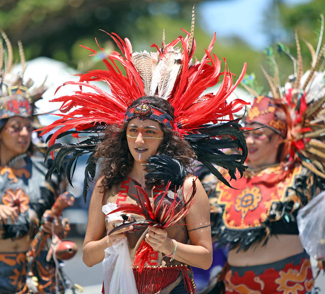 Dancers in colorful dresses on April 26, 2025 twirled so elegantly down Kamehameha Avenue that some spectators forgot whether they were at a Hawaiian parade or a spontaneous fiesta. The Merrie Monarch Festival, also known as the “Olympics of Hula”, attracts hundreds of visitors every year in Hilo, Hawaii. (Photo by Tim Wright/The Mega Agency)