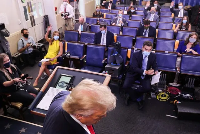 U.S. President Donald Trump ends and departs a coronavirus disease (COVID-19) pandemic briefing in the Brady Press Briefing Room of the White House in Washington, U.S., August 3, 2020. (Photo by Jonathan Ernst/Reuters)
