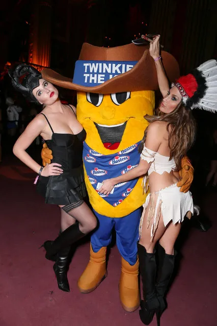 Genevieve Morton, left, and Lee Ann Roberts, right, attend Treats! Halloween with Absolut Elyx in partnership with Utsinger Entertainment at the Los Angeles Theatre on Friday October 31, 2014 in Los Angeles, Calif. (Photo by Alexandra Wyman/Invision for Treats Magazine/AP Images)