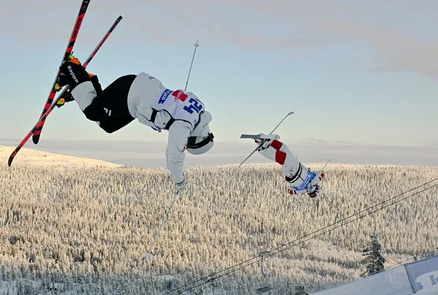 Canada's Mikael Kingsbury (R) and Finland's Severi Vierela compete during the FIS Freestyle Ski World Cup in Idre Fjall, Sweden, on December 11, 2022. (Photo by Nisse Schmidt/TT News Agency via AFP Photo)