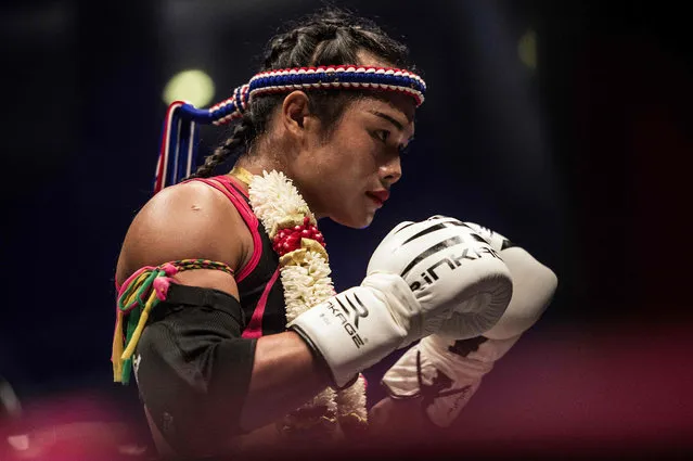 Thai transgender Muay Thai boxer Nong Rose gets ready before her fight against French champion Akram Hamidi (unseen), in Paris on January 6, 2018. Nong Rose Baan Charoensuk, 21- years- old, is making her debut as the first transgender fighter to enter the ring in France. (Photo by Christophe Archambault/AFP Photo)