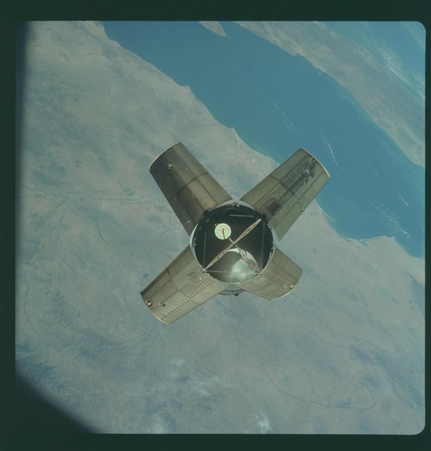 The expended Saturn IVB stage is pictured from the Apollo 7 spacecraft during transposition and docking maneuvers  in this October 11, 1968 NASA handout photo. The photograph is one of more than 12,000 from NASA's archives recently aggregated on the Project Apollo Archive Flickr account. (Photo by Reuters/NASA)