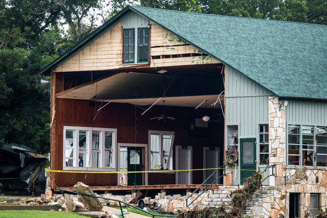 A view of a building missing a wall in the aftermath of deadly flooding at Camp Mystic, on July 7, 2025. (Photo by Sergio Flores/Reuters)