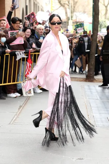 Katy Perry wears a pink fringed suit outside The View in New York City in the last decade of March 2023. (Photo by Christopher Peterson/Splash News and Pictures)