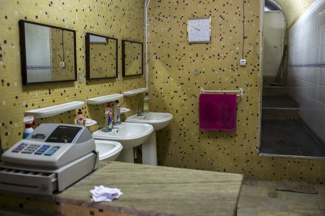 A cash register sits on a table in a ladies' public toilet in downtown Algiers, Algeria October 17, 2015. (Photo by Zohra Bensemra/Reuters)