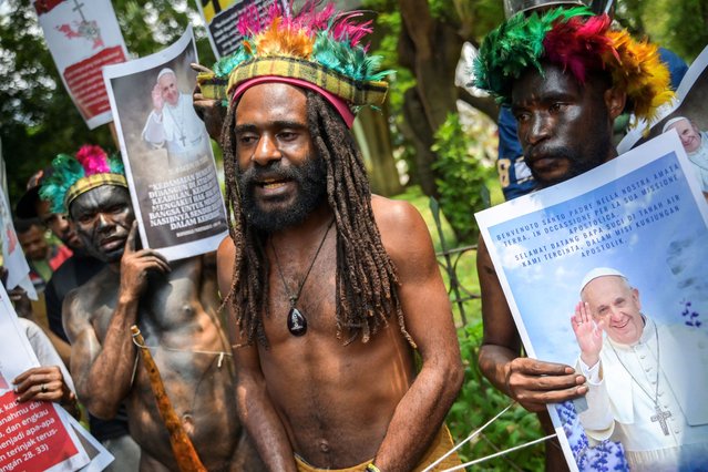 Papuans take part in a protest held in front of the Vatican's embassy in Jakarta on September 4, 2024 to request Pope Francis's immediate intervention against the Indonesian government's military operations in Papua province. (Photo by Bay Ismoyo/AFP Photo)