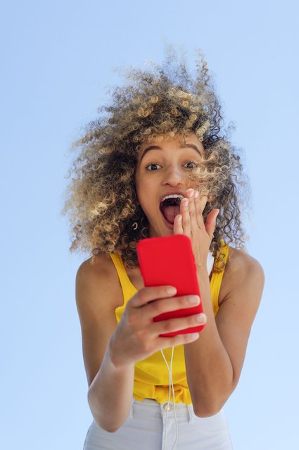 Gorgeous young afro woman having fun in a summer day in Madrid, Spain. (Photo by Westend61/Getty Images)