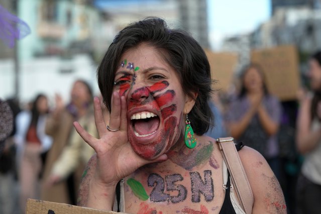 A woman shouts during a demonstration to mark the International Day for the Elimination of Violence against Women in Quito, Ecuador, Monday, November 25, 2024. (Photo by Dolores Ochoa/AP Photo)