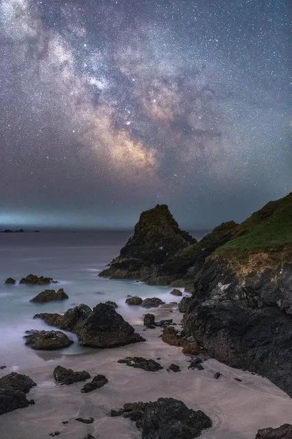 On a family trip to Cornwall after visiting Kynance Cove, on the Lizard Peninsula, the beautiful landscape seemed to be the ideal place for the photographer to capture the glimmering stars and the striking colours of the Milky Way illuminating the beautiful rocky coastline. (Photo by Ainsley Bennett/Astronomy Photographer of the Year 2018)