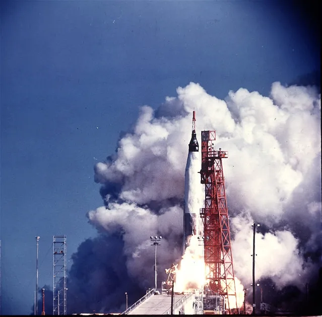 This picture shows the Atlas rocket and the newly-named Mercury spacecraft called Friendship 7 blasting off from Cape Canaveral, Florida, February 20, 1962, carrying Col. John Glenn, Jr., as the first American to orbit the earth.  Astronaut Glenn orbited three times around the globe at 17,400 miles an hour. (Photo by AP Photo/NASA)