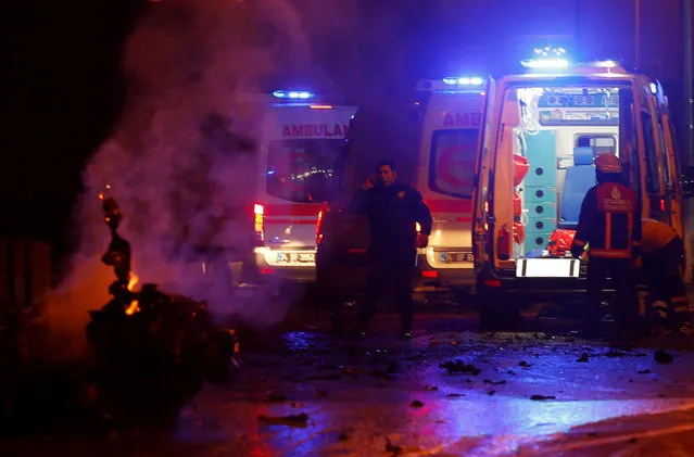 Police and ambulances arrive the scene after a blast in Istanbul, Turkey, December 10, 2016. (Photo by Murad Sezer/Reuters)