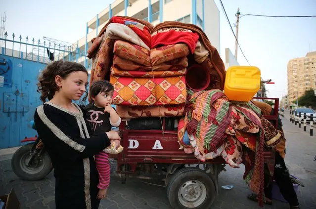 Palestinians return to their homes after “mutual and simultaneous” cease-fire deal between Israel and Hamas reached with Egypt mediation took effect at 2 a.m. Friday (2300GMT Thursday), ending the 11-day conflict in Beit Hanoun, Gaza on May 21, 2021. (Photo by Hassan Jedi/Anadolu Agency via Getty Images)