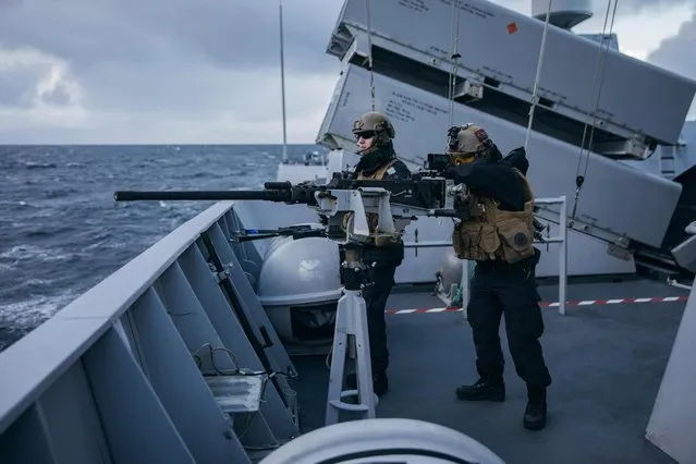 A handout photo made available by the Norwegian Armed Forces shows Royal Norwegian Navy artillerists at HNoMS Thor Heyerdahl during exercise Trident Juncture 18 off the Nordland coast, Norway, 22 October 2018 (issued 25 October 2018). According to reports, some 50,000 participants from over 30 nations are expected to take part in the NATO-led military exercise in Norway from 25 October to 23 November 2018. (Photo by Oda Linnea Brekke Iden/EPA/EFE)