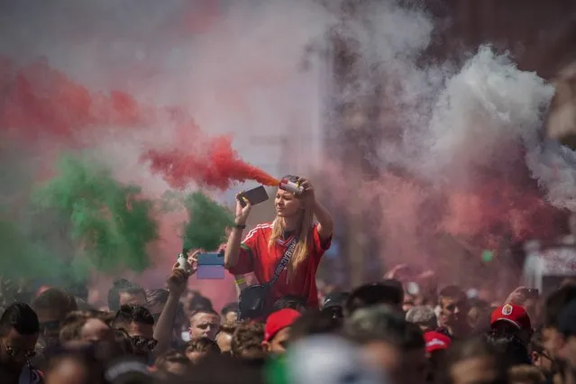 Hungarian fans march towards the Puskas Arena in Budapest, Hungary, 15 June 2021, just hours before Hungary will face Portugal i​n their UEFA EURO 2020 group F preliminary round soccer match. (Photo by Zoltan Balogh/EPA/EFE)