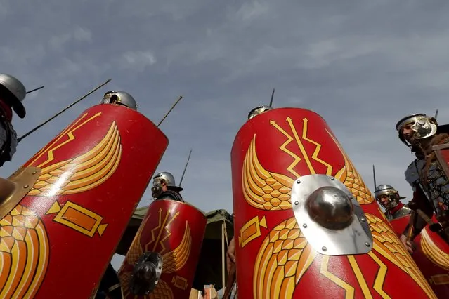 Members of the Legio X Fretensis (Malta) re-enactment group take part in a display of ancient Roman army life at Fort Rinella in Kalkara, outside Valletta, March 22, 2015. (Photo by Darrin Zammit Lupi/Reuters)