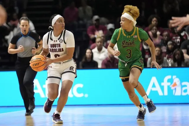 South Carolina guard Te-Hina Paopao (0) is guarded by Notre Dame guard Hannah Hidalgo (3) during the first half of an NCAA college basketball game Monday, November 6, 2023, in Paris. (Photo by Thibault Camus/AP Photo)