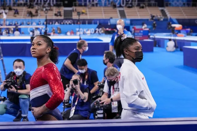 Jordan Chiles of Team United States, left, and Simone Biles of Team United States after Biles was pulled out of the meet for medical reasons, during the Women's Team Final on day four at Ariake Gymnastics Centre at the Tokyo 2020 Olympic Games on Tuesday, July 27. 2021. (Photo by Toni L. Sandys/The Washington Post)