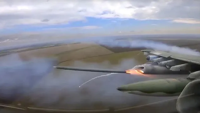 In this handout photo taken from video and released by Russian Defense Ministry Press Service on Sunday, October 16, 2022, An Su-25 ground attack jet of the Russian air force fires a rocket on a mission over Ukraine. (Photo by Russian Defense Ministry Press Service via AP Photo)
