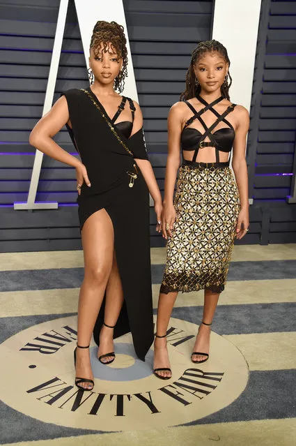 Chloe Bailey and Halle Bailey of Chloe X Halle attend the 2019 Vanity Fair Oscar Party hosted by Radhika Jones at Wallis Annenberg Center for the Performing Arts on February 24, 2019 in Beverly Hills, California. (Photo by Gregg DeGuire/FilmMagic)