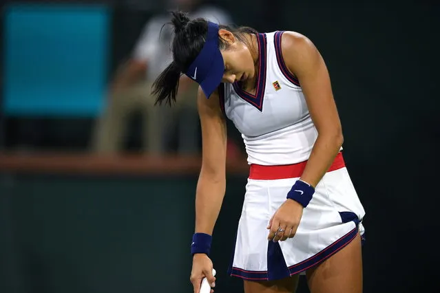 Emma Raducanu reacts after losing a point to Alaksandra Sasnovich at the BNP Paribas Open tennis tournament Friday October 8, 2021, in Indian Wells, Calif. (Photo by Mark J. Terrill/AP Photo)