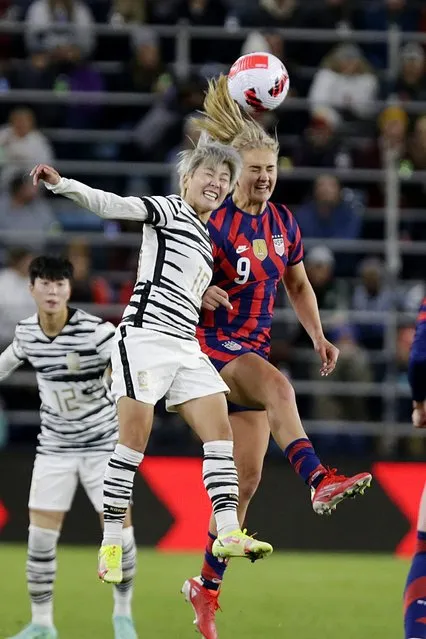 United States' midfielder Lindsey Horan (9) and South Korea's midfielder Yuri Choe (11) head the ball in the second half of a soccer friendly match, Tuesday, October 26, 2021, in St. Paul, Minn. (Photo by Andy Clayton-King/AP Photo)