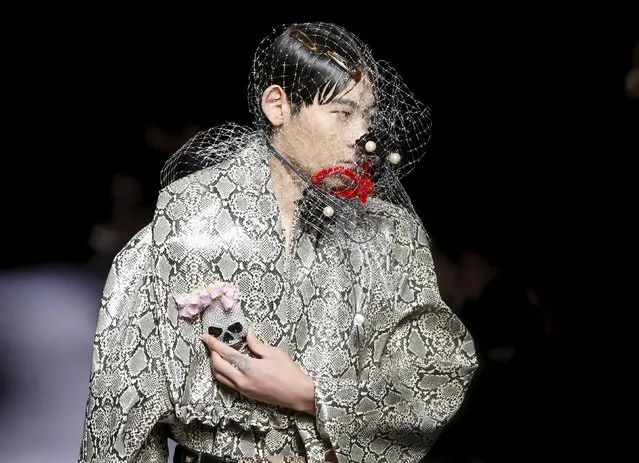 A model presents creation by designer Ryota Murakami and Chiaki Murakami from their Autumn/Winter 2016 collection for their brand RYOTAMURAKAMI during Tokyo Fashion Week in Tokyo, Japan, March 18, 2016. (Photo by Issei Kato/Reuters)