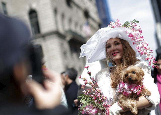 A woman takes part in the annual Easter Parade and Bonnet Festival along 5th Avenue in New York City March 27, 2016. (Photo by Brendan McDermid/Reuters)