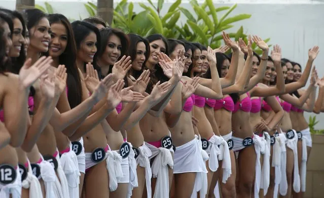 Contestants for this year's Binibining Pilipinas (Miss Philippines) , the winner of which will represent Philippines at the Miss Universe 2016 beauty contest, wave to photographers during their presentation to the media at Quezon city, Metro Manila March 29, 2016. (Photo by Erik De Castro/Reuters)