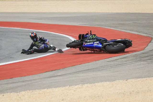 Yamaha Spanish rider Alex Rins falls during the MotoGP sprint race of the Portuguese Grand Prix at the Algarve International Circuit in Portimao on March 23, 2024. (Photo by Patrícia de Melo Moreira/AFP Photo)